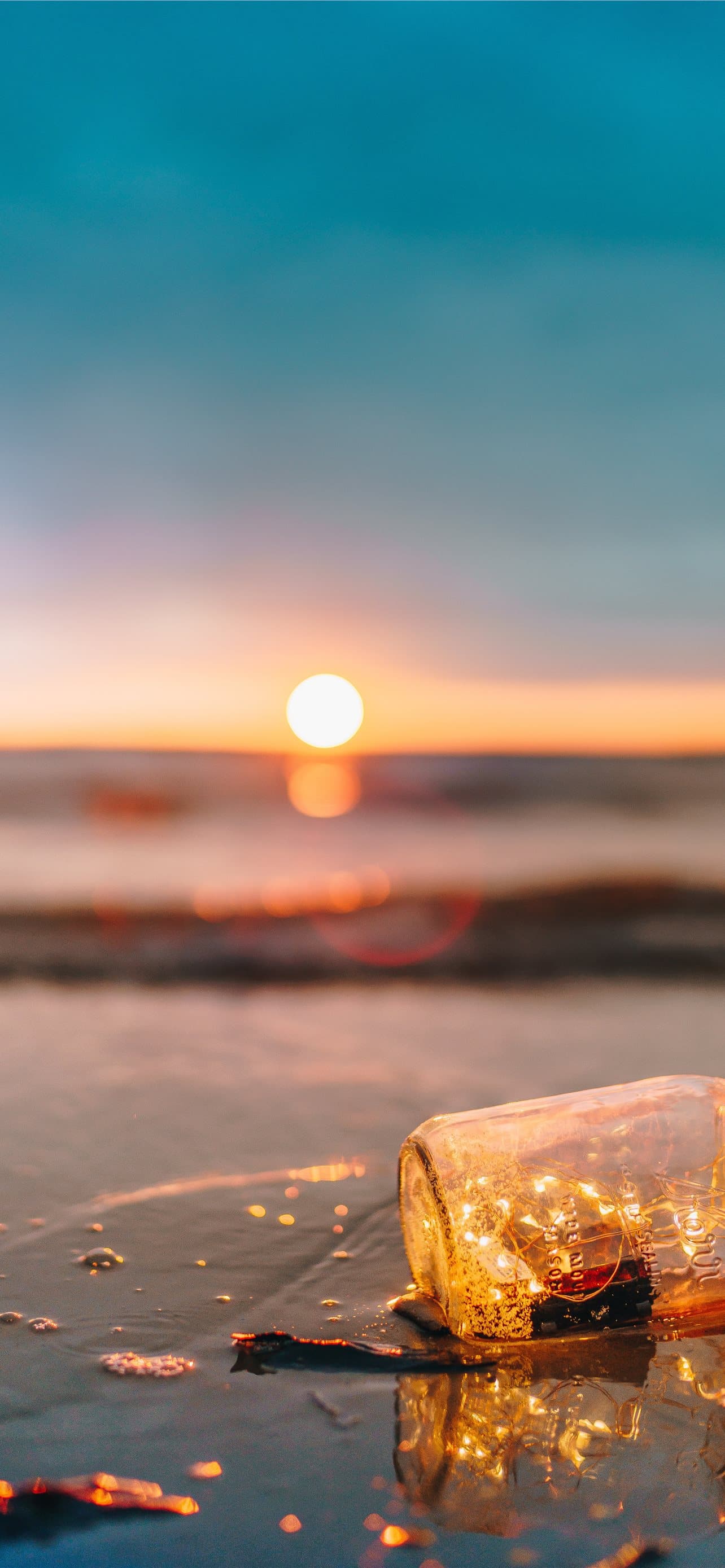 Clear Glass Mason Jar On Beach During Sunset - free HD phone wallpaper for iPhone and Android, 1284x2778